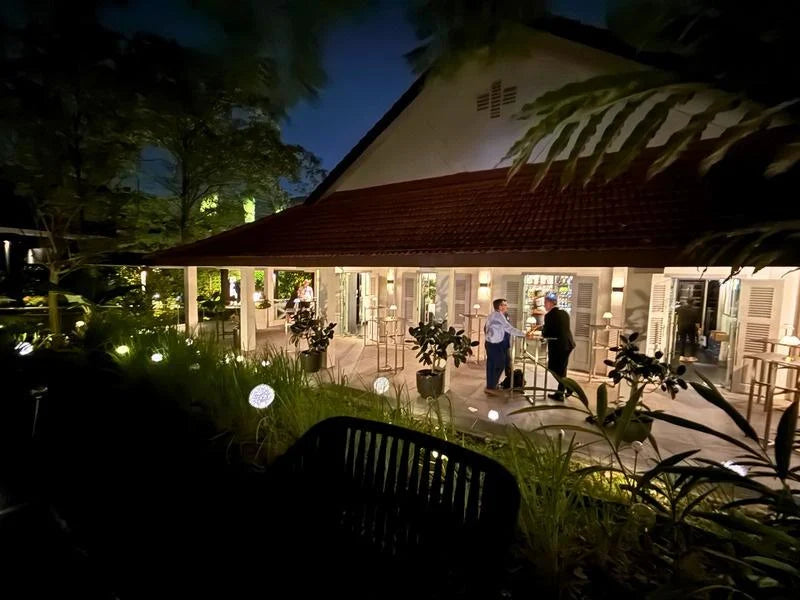 Quentin’s Sentosa in its illuminated heritage building in the evening