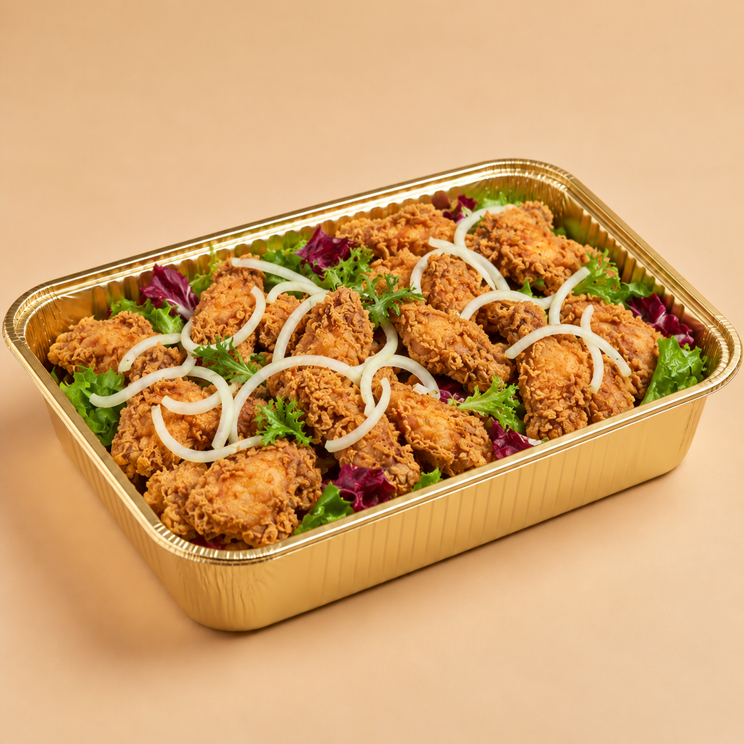 Quentin’s crispy fried chicken wings in a gold mini buffet tray