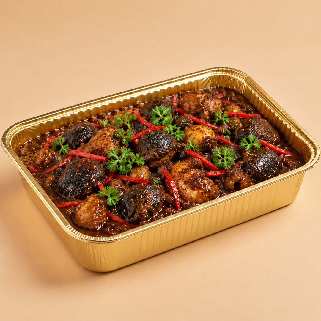 Quentin’s Keluak Curry in a gold mini buffet tray