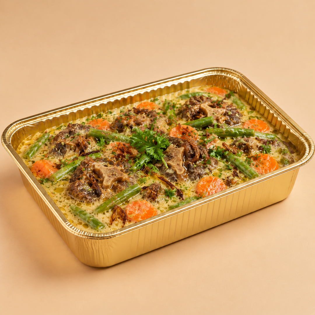 Quentin’s oxtail stew in a gold mini buffet tray
